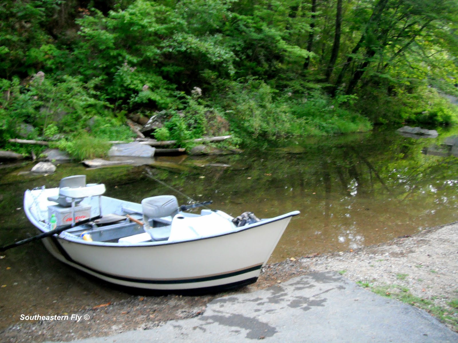 Boat on Lake Hiwassee with mountain water views