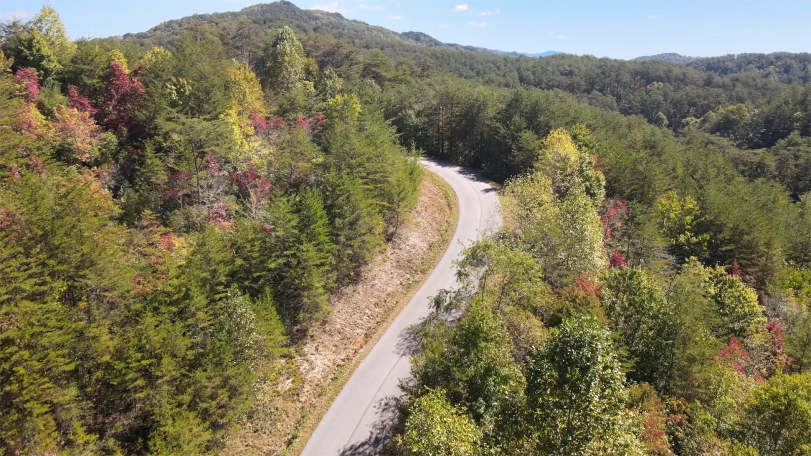 Private paved mountain road inside Eagle's Nest Retreat